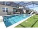 Inviting screened-in pool area with refreshing blue water and plenty of seating for outdoor relaxation at 13617 Haulover Beach Ln, Orlando, FL 32827