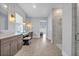 Spacious bathroom featuring dual vanities, sleek countertops and a glass-enclosed shower at 14559 Walcott Ave, Orlando, FL 32827
