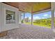 Enjoy outdoor living on this paver patio overlooking the backyard with playground and serene landscaping at 14559 Walcott Ave, Orlando, FL 32827