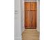 Hallway with beautiful wood cabinets and minimalist hardware at 14559 Walcott Ave, Orlando, FL 32827
