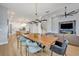 Open concept home design showcasing living, dining and kitchen areas at 14559 Walcott Ave, Orlando, FL 32827