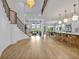 Expansive living area showing the kitchen, dining, and living spaces with high ceilings and natural light at 14559 Walcott Ave, Orlando, FL 32827