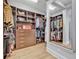 Spacious walk-in closet with custom shelving and ample storage solutions at 14559 Walcott Ave, Orlando, FL 32827