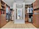 Large walk-in closet with custom shelving and ample storage at 14559 Walcott Ave, Orlando, FL 32827
