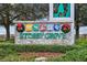 An inviting community sign for Storey Grove enhances the neighborhood's curb appeal at 15210 Chapter Way, Winter Garden, FL 34787