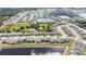 Expansive aerial view of a neighborhood with multiple ponds and lush greenery at 1539 Wynell St, St Cloud, FL 34771