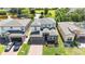Aerial view of a home with well-manicured lawn and landscaping at 1539 Wynell St, St Cloud, FL 34771