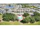 Aerial view of the community with a pool and surrounding homes at 1539 Wynell St, St Cloud, FL 34771