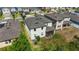 Aerial view of the backyard showcasing an outdoor living space and well-maintained landscaping at 1539 Wynell St, St Cloud, FL 34771