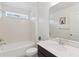 Clean bathroom features a large mirror, and modern fixtures at 1539 Wynell St, St Cloud, FL 34771
