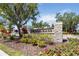 Beautiful stone community sign with manicured landscaping at 1539 Wynell St, St Cloud, FL 34771