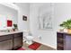 Bright bathroom with modern fixtures, vanity, and neutral decor at 16078 St Clair St, Clermont, FL 34714
