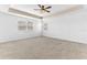 Neutral bedroom featuring a ceiling fan and neutral colored walls at 16078 St Clair St, Clermont, FL 34714