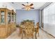 Elegant dining room with stylish furnishings and a decorative display cabinet at 16078 St Clair St, Clermont, FL 34714
