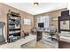 Office space featuring a desk, shelves, and carpet at 16078 St Clair St, Clermont, FL 34714