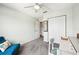 Bedroom with neutral walls featuring carpeted floors, a closet, and chair at 1986 Yellowfin Dr, Port Orange, FL 32128