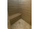 This shower features horizontal tile, a built-in bench, and a modern drain at 2236 Dancy Trail Trl, Clermont, FL 34714