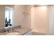 Clean bathroom with a sink, granite countertop and a tub-shower combo at 2415 Sweet Viburnum Way, Ocoee, FL 34761