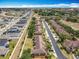 Aerial street view with sidewalks showcases a well-planned residential area with a mix of home styles at 2744 Calabria Ave, Davenport, FL 33897