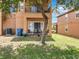Cozy backyard patio area with seating, perfect for outdoor relaxation and entertaining at 2744 Calabria Ave, Davenport, FL 33897