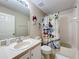 Bathroom featuring a Mickey Mouse themed shower curtain and vanity at 2744 Calabria Ave, Davenport, FL 33897