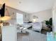 Bedroom with dual cribs, comfortable glider, and stylish decor at 2744 Calabria Ave, Davenport, FL 33897