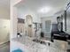 Corner kitchen featuring dark cabinets, stainless steel appliances, and granite countertops at 2744 Calabria Ave, Davenport, FL 33897