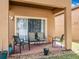 Cozy patio with seating, perfect for outdoor relaxation at 2744 Calabria Ave, Davenport, FL 33897