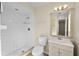 Bathroom with shower, modern vanity, and tiled walls at 288 Howard Blvd, Longwood, FL 32750