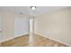 Spacious bedroom with closet, neutral walls, and wood-look flooring at 288 Howard Blvd, Longwood, FL 32750