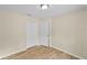 Comfortable bedroom with closet, neutral walls, and wood-look flooring at 288 Howard Blvd, Longwood, FL 32750