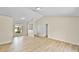 Spacious living room features neutral tones, wood-look floors, and ample natural light at 288 Howard Blvd, Longwood, FL 32750