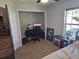 Functional bedroom nook perfect for a study or gaming setup, lit by natural light at 326 Woodland Trl, Lady Lake, FL 32159