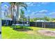 Lawn featuring a trampoline and backyard fencing at 3328 Fox Ridge, Winter Haven, FL 33884