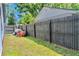 Backyard view with a wood fence at 3328 Fox Ridge, Winter Haven, FL 33884