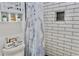 Updated bathroom featuring a shower with subway tile and decorative curtain at 3328 Fox Ridge, Winter Haven, FL 33884