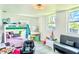 This bedroom features a bunk bed, vanity, and fun decor at 3328 Fox Ridge, Winter Haven, FL 33884