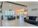 Spacious living area with tile floors and access to a dining area at 3328 Fox Ridge, Winter Haven, FL 33884