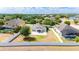Aerial backyard view with ample green space and a decorative patio provides privacy and room for outdoor living at 337 Giovani Blvd, Clermont, FL 34715