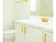 Modern bathroom with white vanity, gold hardware, and sleek fixtures at 337 Giovani Blvd, Clermont, FL 34715