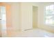 Bedroom with closet, window, and white marble floor at 337 Giovani Blvd, Clermont, FL 34715