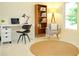 Stylish home office with modern desk, chair, and bookshelf at 337 Giovani Blvd, Clermont, FL 34715