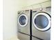 Modern laundry room featuring LG washer and dryer at 337 Giovani Blvd, Clermont, FL 34715