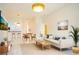 Spacious living room and dinning room with ample lighting and modern decor at 337 Giovani Blvd, Clermont, FL 34715