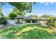 Spacious back yard with mature trees and shade for outdoor enjoyment at 3601 Midiron Dr, Winter Park, FL 32789