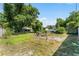 Back yard with patio area, perfect for outdoor dining and relaxing at 3601 Midiron Dr, Winter Park, FL 32789