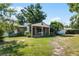 Charming home featuring a cozy front porch and well-maintained landscaping at 3601 Midiron Dr, Winter Park, FL 32789