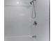 Clean white tiled shower with adjustable shower head and tub, ready for relaxation at 3601 Midiron Dr, Winter Park, FL 32789
