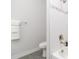 Clean bathroom showcasing modern fixtures, white tile, and a shower with bronze hardware at 3777 Sw 130Th Loop, Ocala, FL 34473