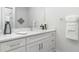 Elegant bathroom featuring quartz countertops, modern fixtures, and decorative accents at 3777 Sw 130Th Loop, Ocala, FL 34473